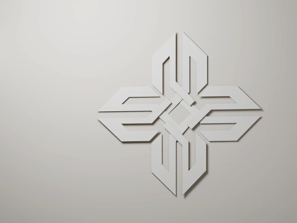 A warm porcelain AETHERUS mark with four equal woven arms and an open center